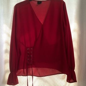 Long sleeved red blouse